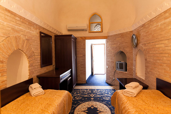 Usbekistan Reise  In Chiwa befindet sich eines unserer Hotels in einer alten Medrese. Hier ein Zimmer davon.